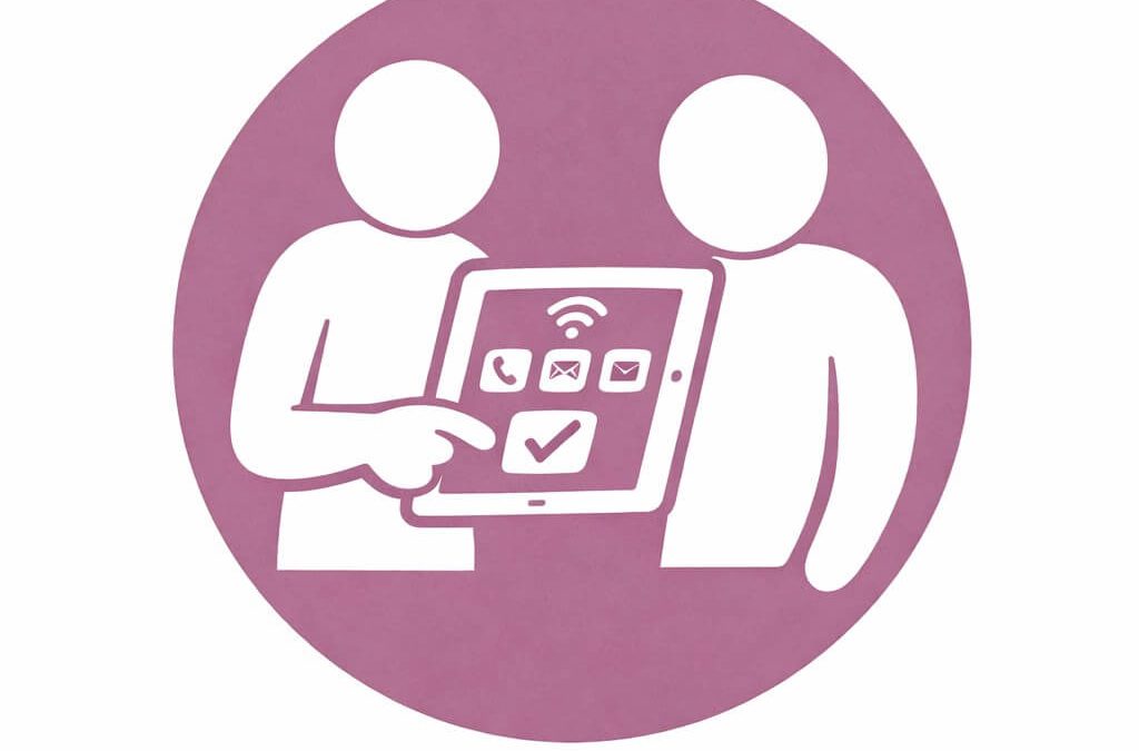 Asiakas ja yrittäjä katsovat yhdessä tablettia ja yrittäjä i opastaa asiakasta.